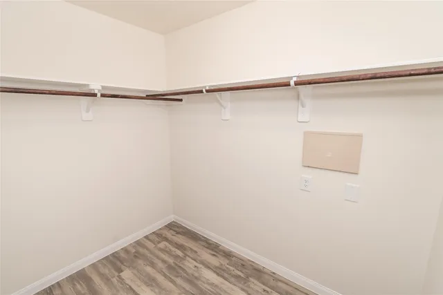 an outdoor view of house with outdoor space and lake view