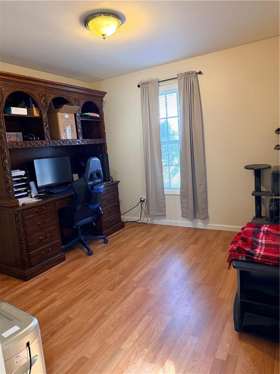 59 Indian Hills Drive Rydal, GA 30171 - Photo 24 of 35 a living room with hard wood floors and a window