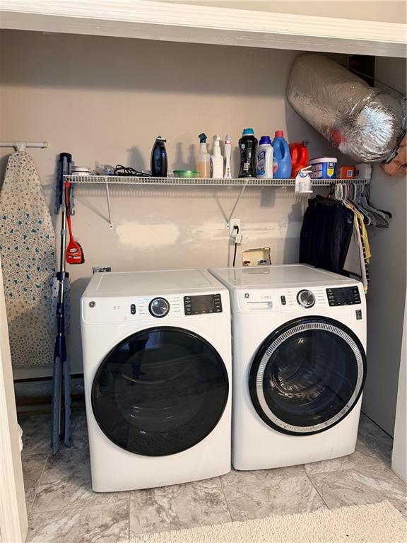 59 Indian Hills Drive Rydal, GA 30171 - Photo 28 of 35 a utility room with dryer and washer