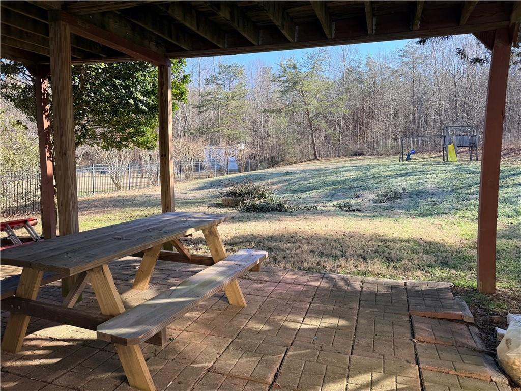 59 Indian Hills Drive Rydal, GA 30171 - Photo 30 of 35 a view of a backyard with sitting area