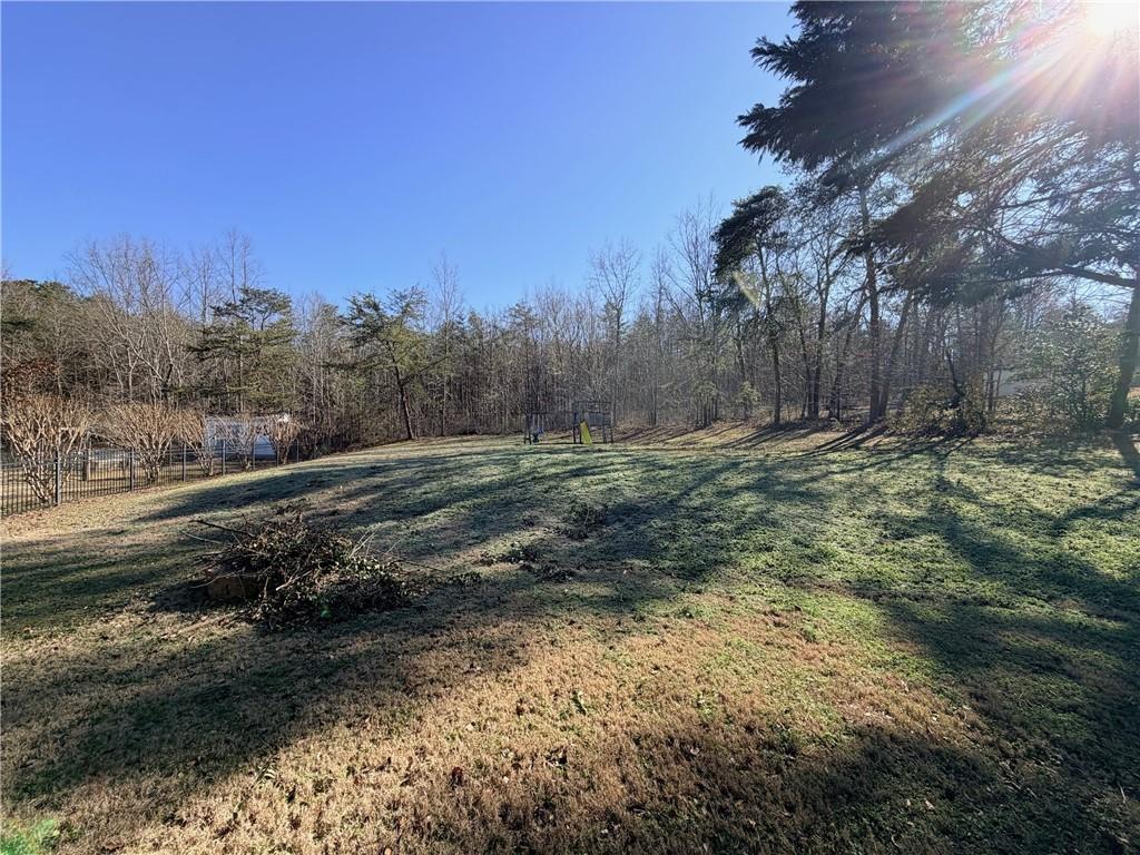 59 Indian Hills Drive Rydal, GA 30171 - Photo 31 of 35 a big yard with lots of green space