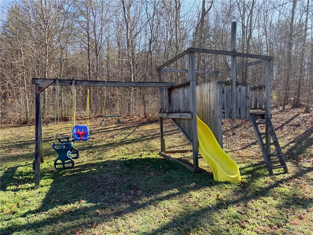59 Indian Hills Drive Rydal, GA 30171 - Photo 33 of 35 a view of a park with slide