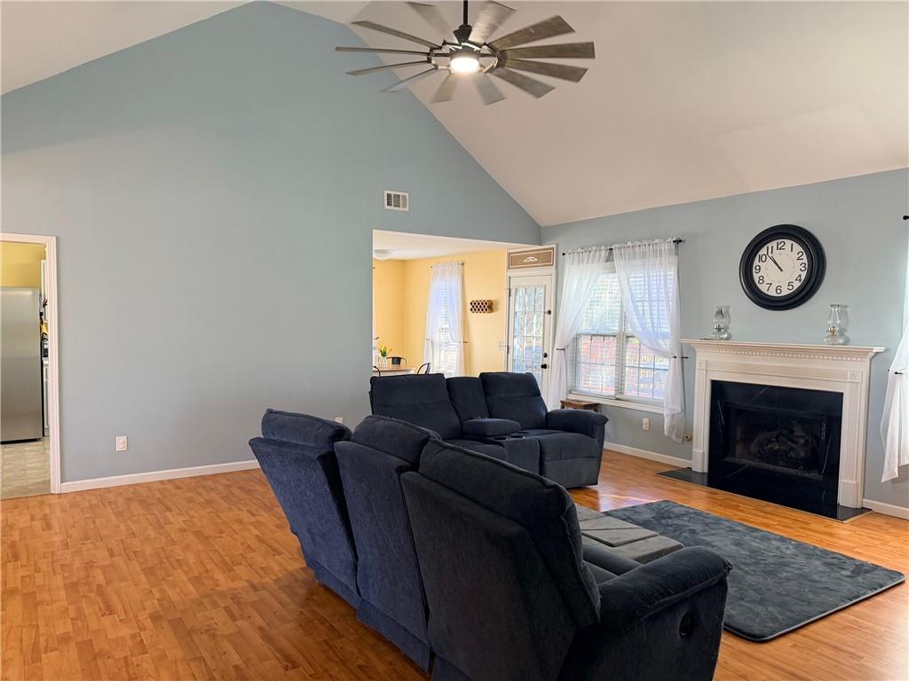 59 Indian Hills Drive Rydal, GA 30171 - Photo 5 of 35 a living room with furniture and a fireplace