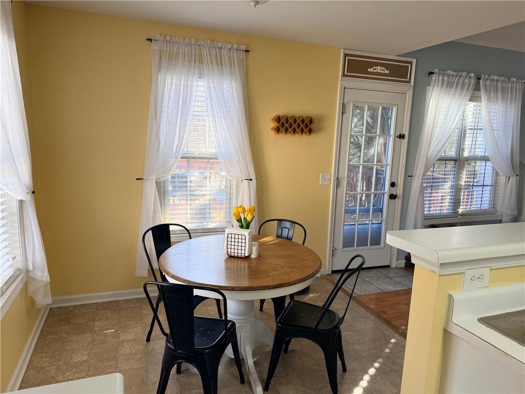59 Indian Hills Drive Rydal, GA 30171 - Photo 8 of 35 a view of a dining room with furniture and window