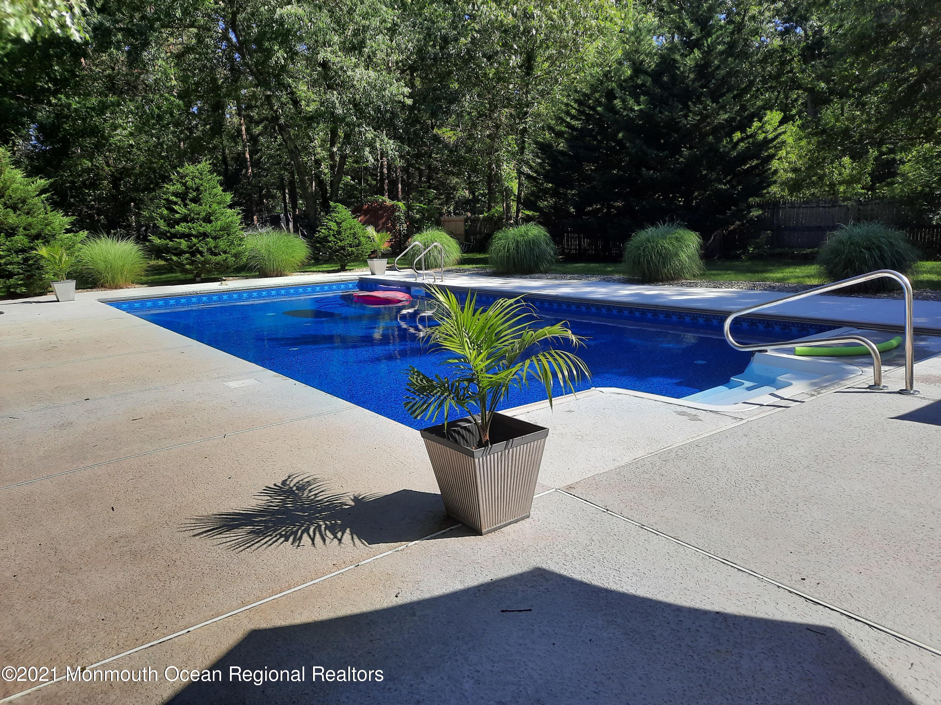5 Dunhill Road Jackson, NJ 08527 - Photo 8 of 11 a view of yard with patio