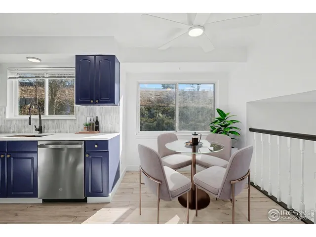 a bedroom with a bed and a television