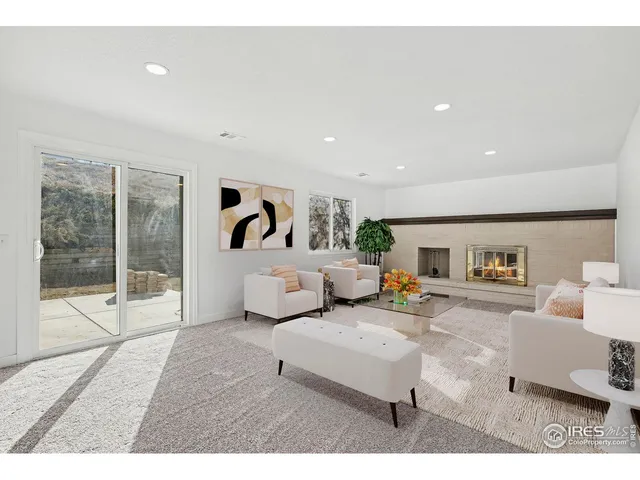a open kitchen with a sink window and cabinets