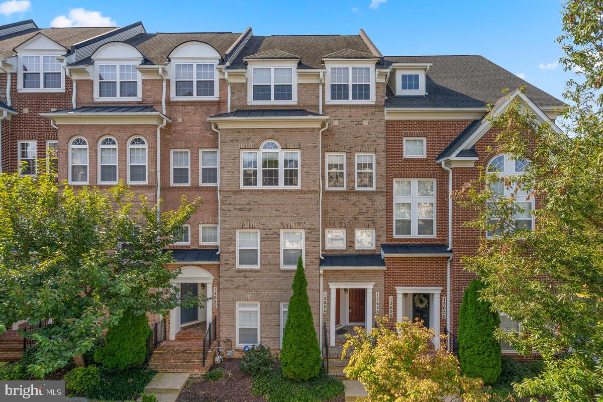 13626 Dover Cliffs Place Germantown, MD 20874 - Photo 2 of 32 a front view of a multi story building
