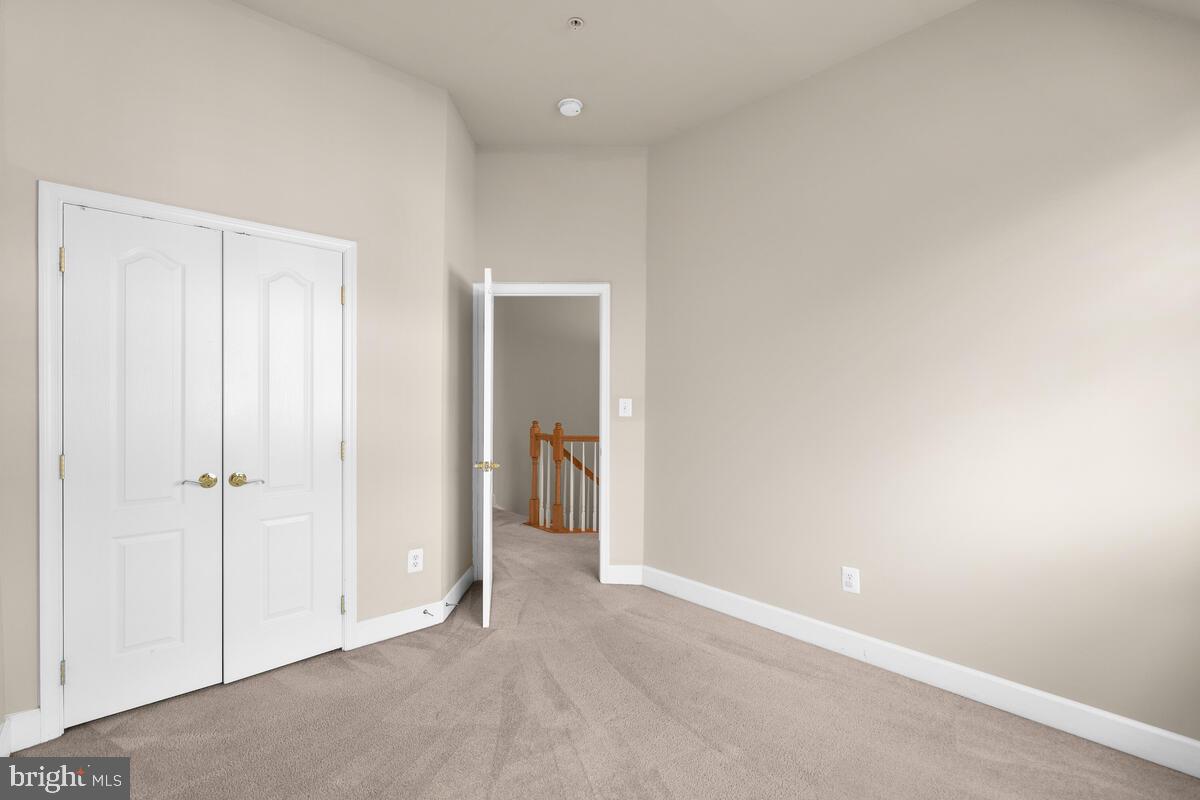 13626 Dover Cliffs Place Germantown, MD 20874 - Photo 24 of 32 an empty room with closet area