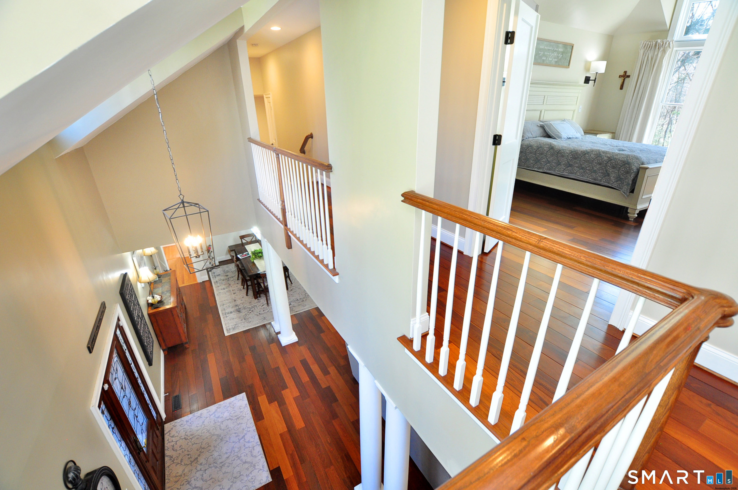 82 Indian Hill Road Canton, CT 06019 - Photo 20 of 41 Staircase leads to the upper level