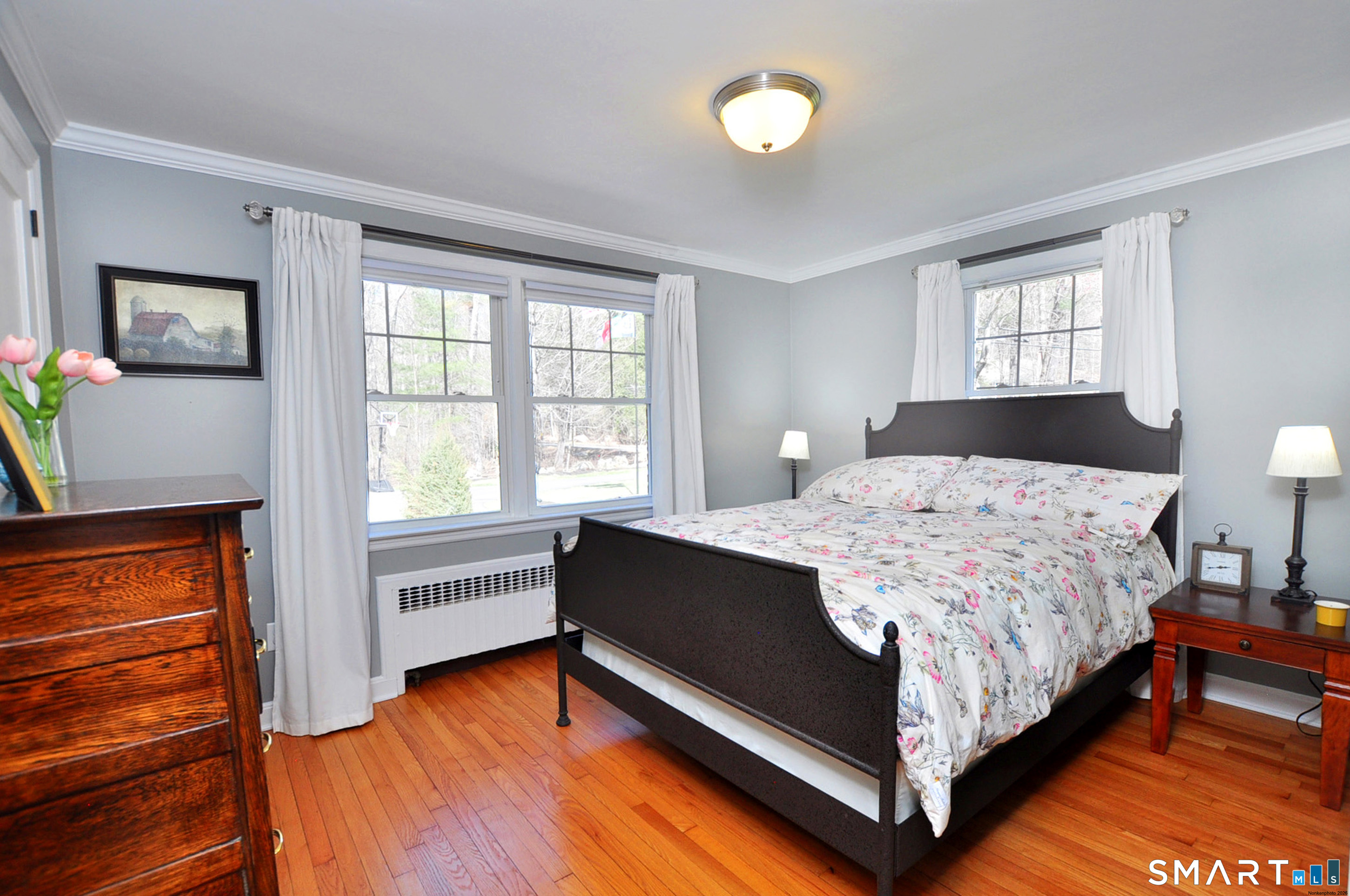 82 Indian Hill Road Canton, CT 06019 - Photo 28 of 41 Spacious bedroom on the main level with gorgeous hardwood