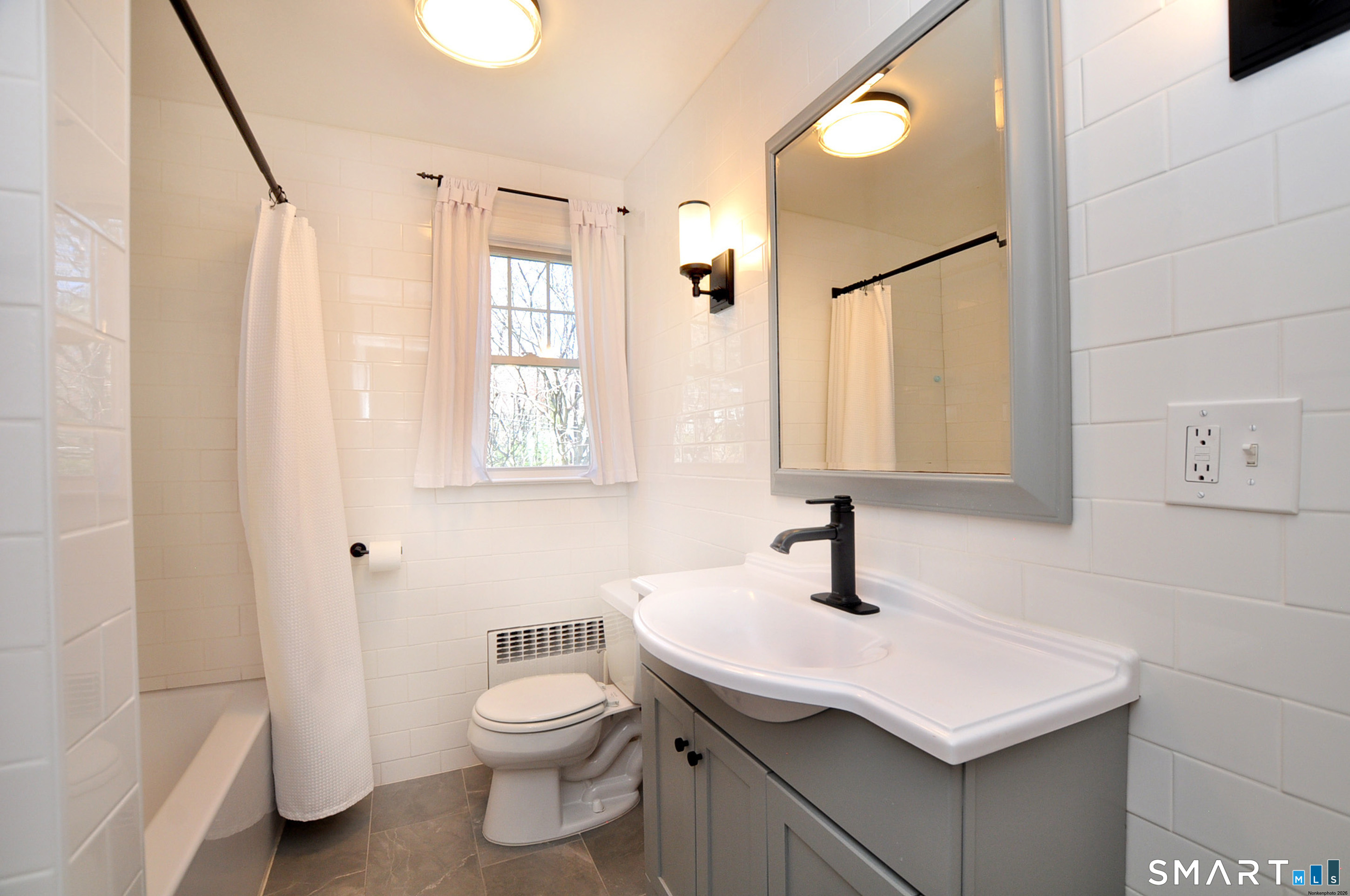 82 Indian Hill Road Canton, CT 06019 - Photo 29 of 41 Spacious and updated bath on the main level