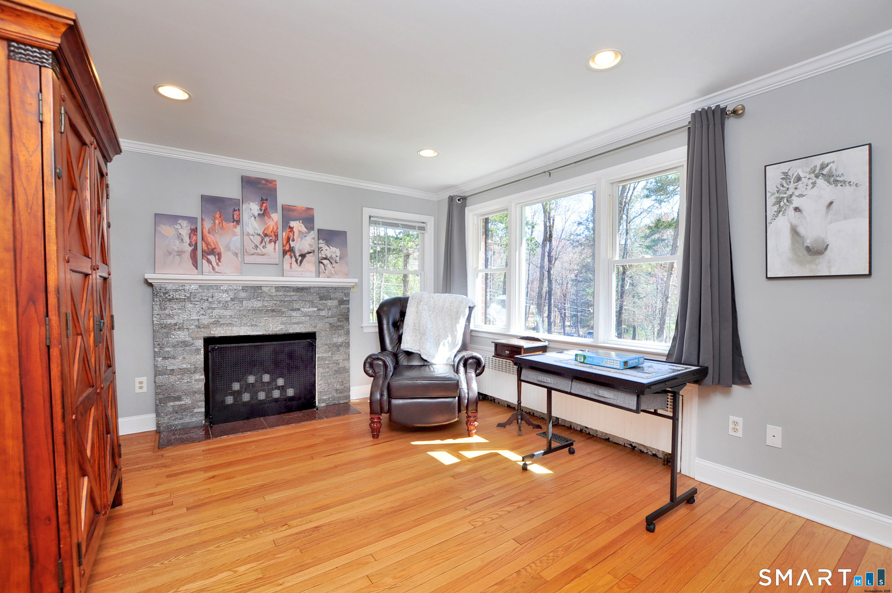 82 Indian Hill Road Canton, CT 06019 - Photo 31 of 41 Perfect room for a 5th bedroom, office or den. Unlimited possibilities. Gorgeous fireplace!