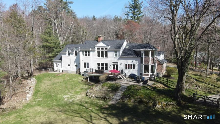 82 Indian Hill Road Canton, CT 06019 - Photo 37 of 38 a view of a house with a yard