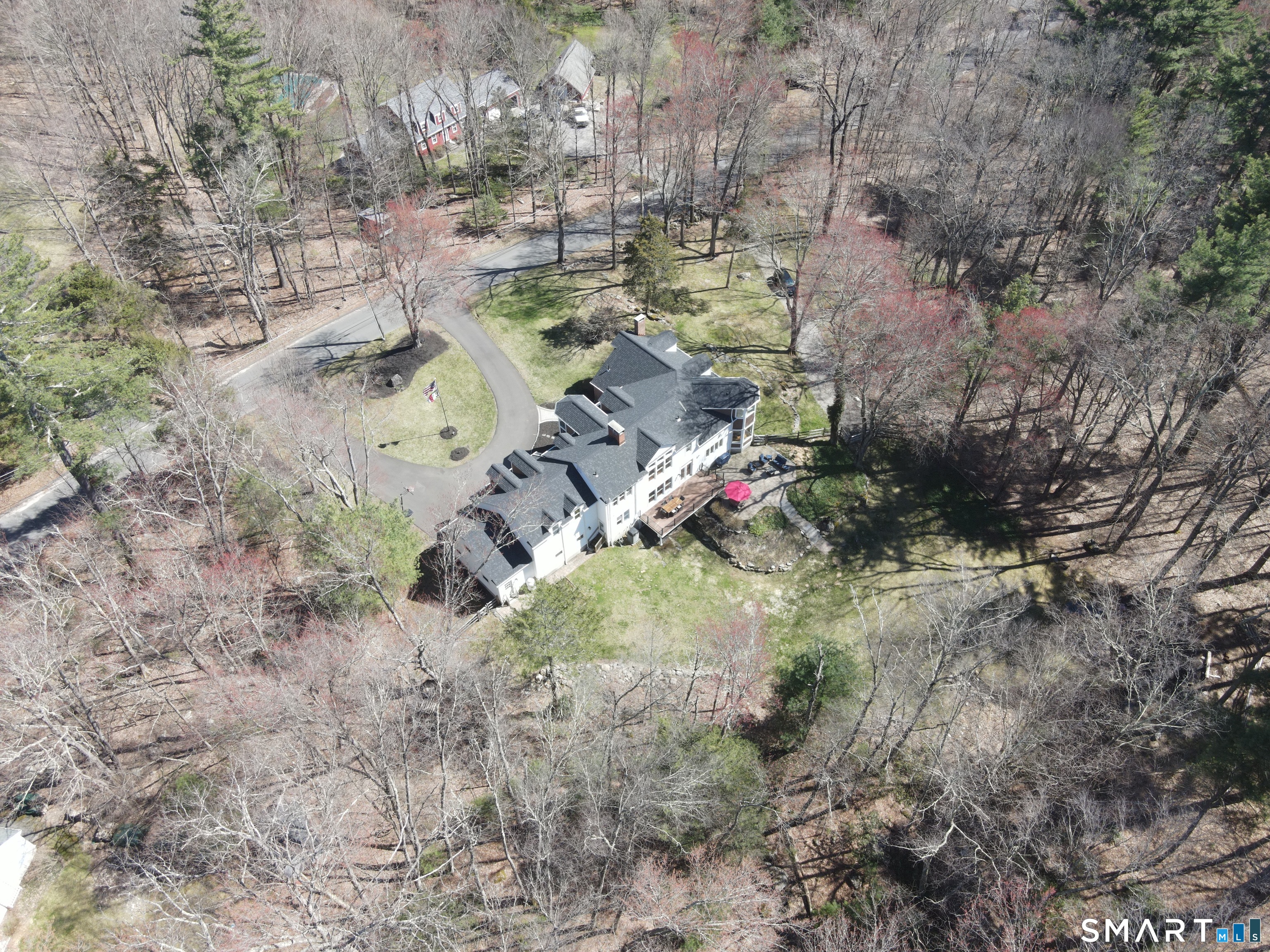 82 Indian Hill Road Canton, CT 06019 - Photo 38 of 38 a view of outdoor space and a car parked