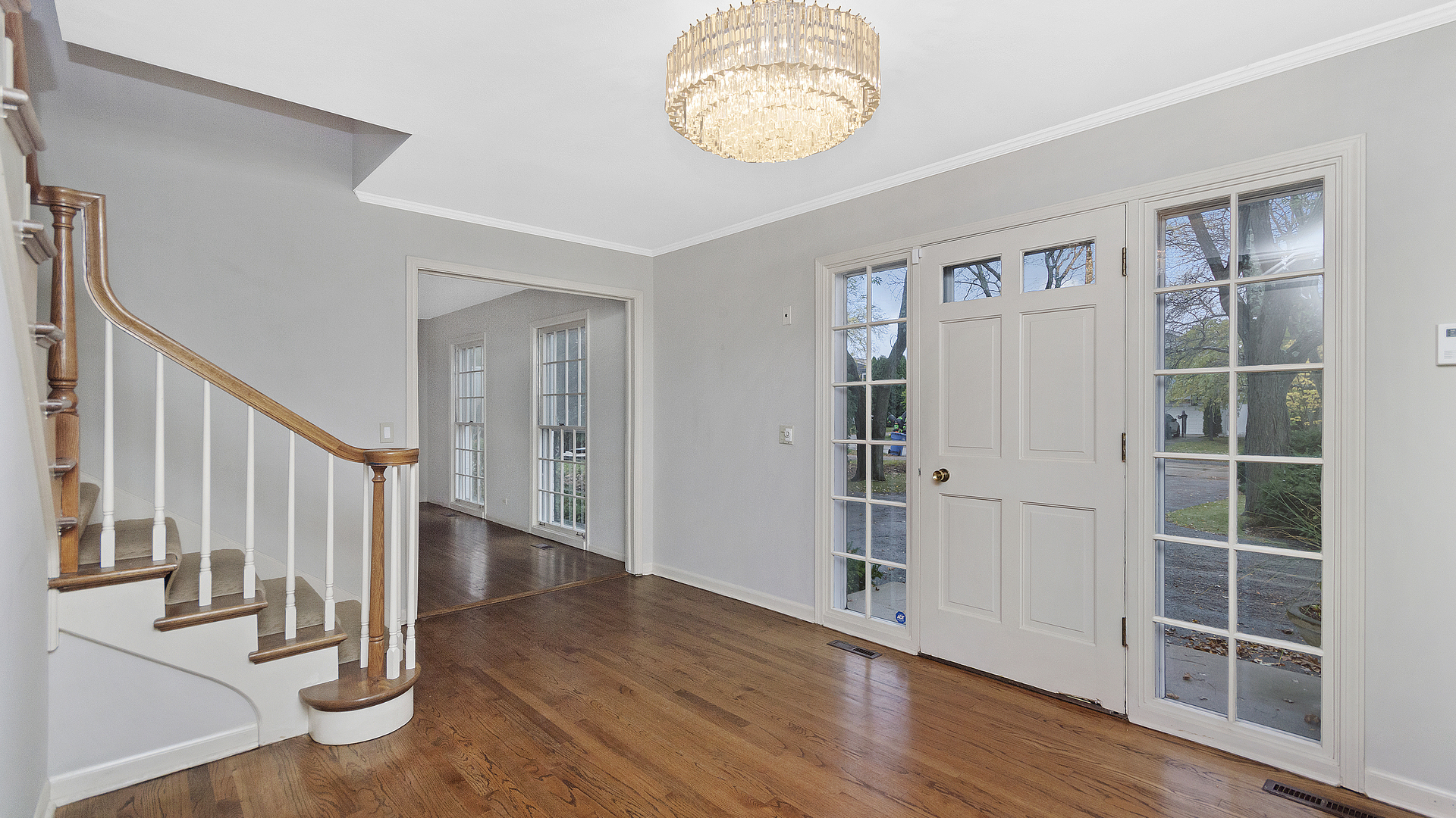 2091 Old Briar Road Highland Park, IL 60035 - Photo 2 of 19 a view of an empty room with wooden floor and entryway