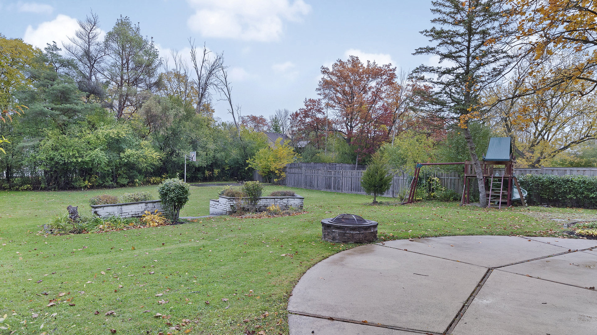 2091 Old Briar Road Highland Park, IL 60035 - Photo 15 of 19 a front view of a house with garden and trees