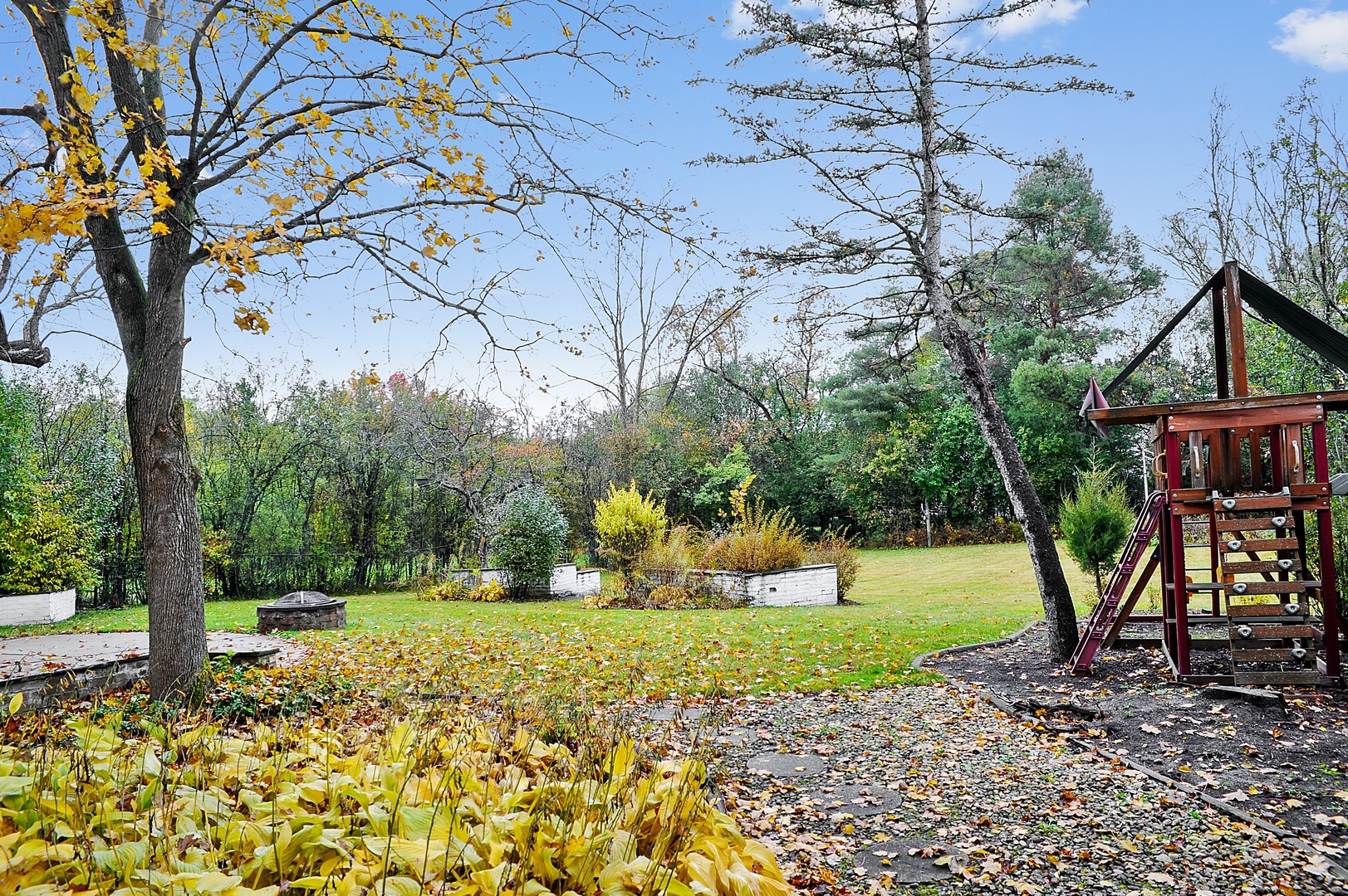 2091 Old Briar Road Highland Park, IL 60035 - Photo 16 of 19 a view of a backyard with large trees