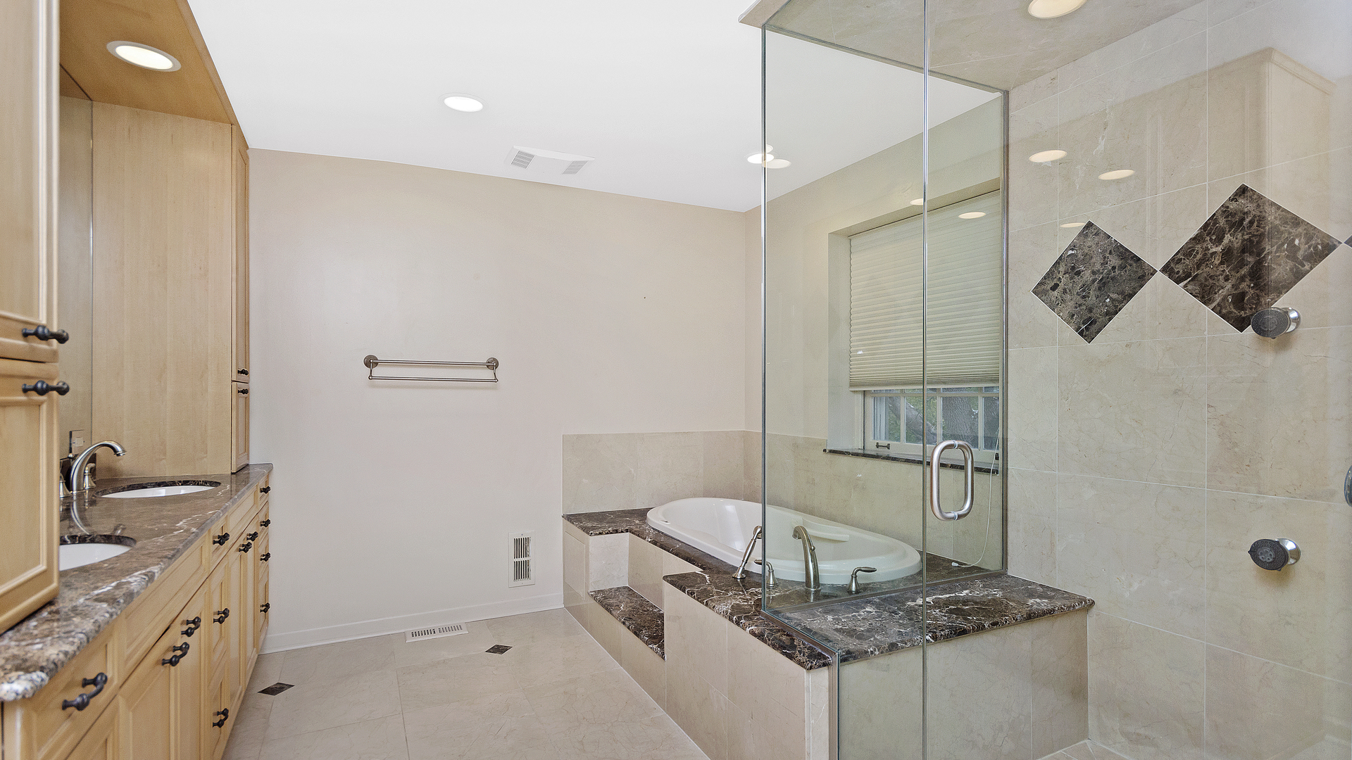 2091 Old Briar Road Highland Park, IL 60035 - Photo 9 of 19 a bathroom with a granite countertop sink a toilet a mirror and shower