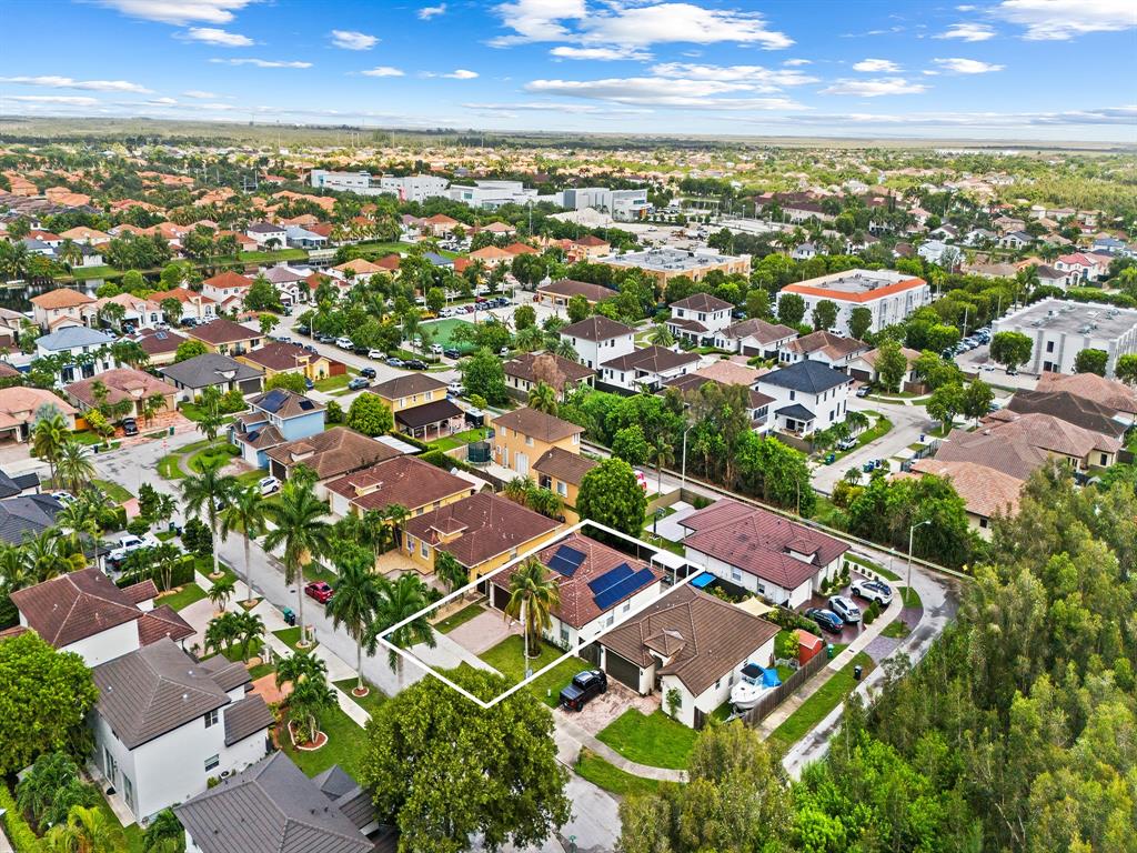 14815 Southwest 28 Lane Miami, FL 33185 - Photo 19 of 19 an aerial view of residential houses with outdoor space