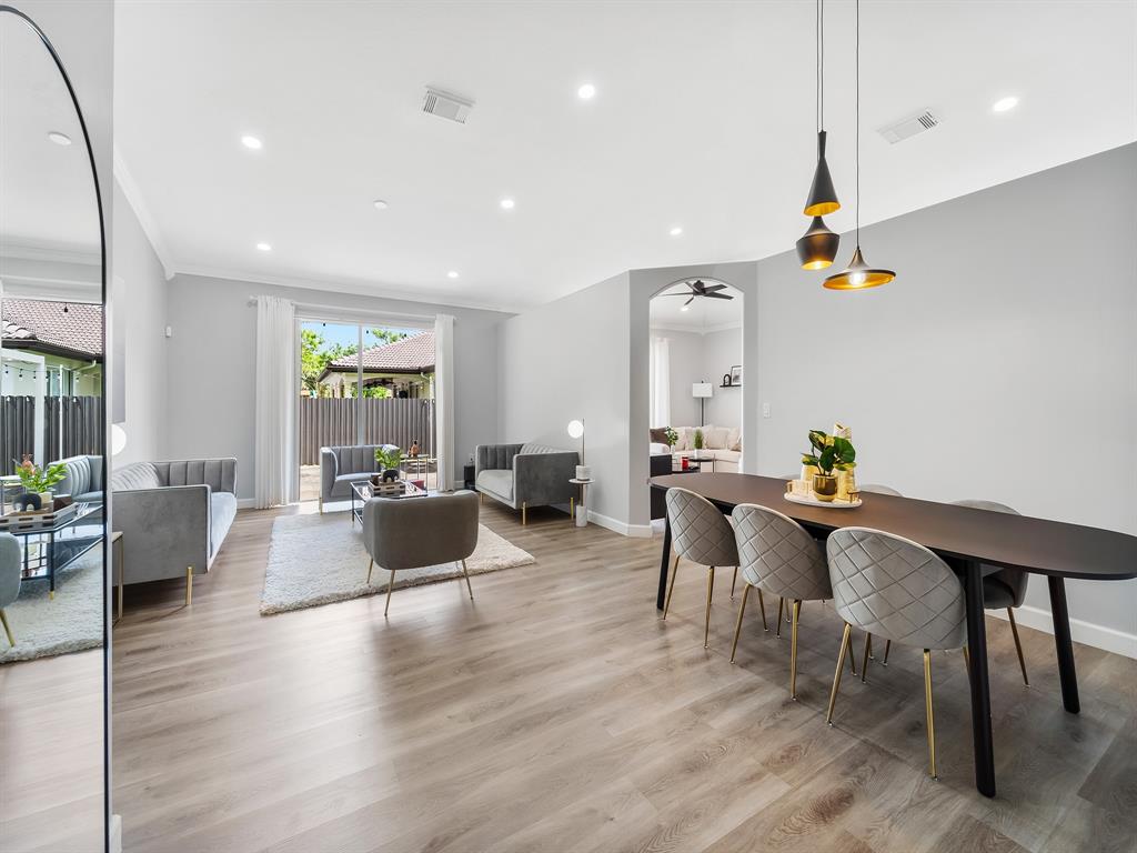 14815 Southwest 28 Lane Miami, FL 33185 - Photo 4 of 19 a living room with furniture wooden floor and a table