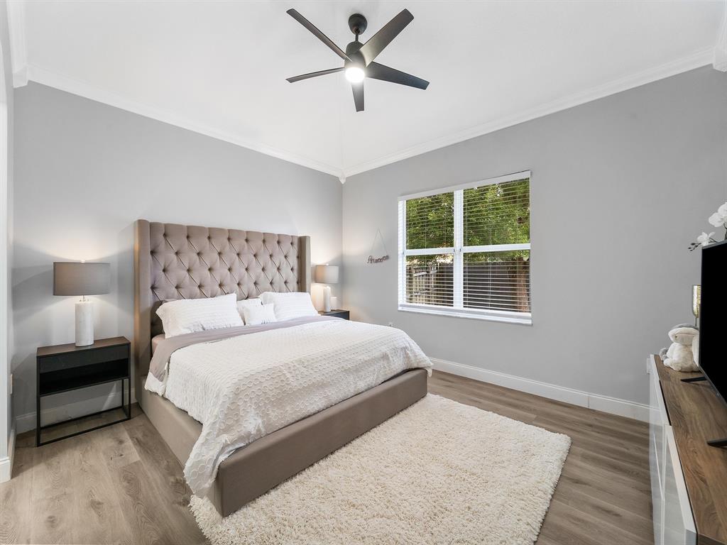 14815 Southwest 28 Lane Miami, FL 33185 - Photo 10 of 19 a bedroom with a large bed and a window