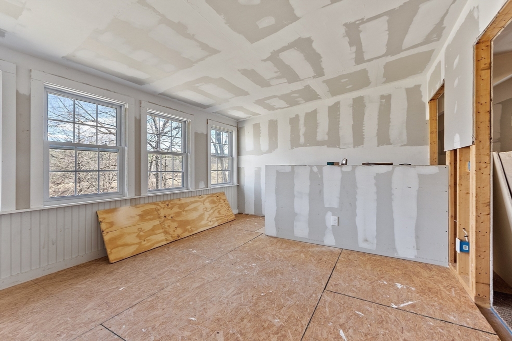 291 Still River Road Harvard, MA 01451 - Photo 38 of 42 an empty room with windows