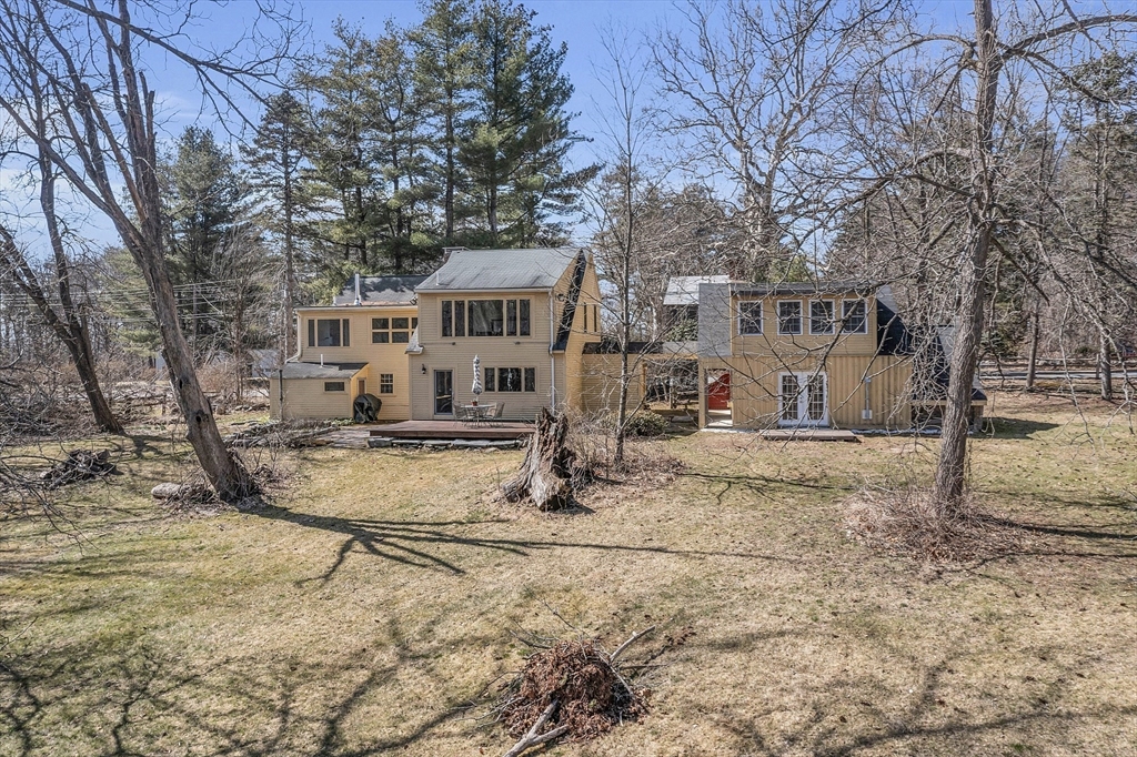 291 Still River Road Harvard, MA 01451 - Photo 40 of 42 a view of a house with snow on the road