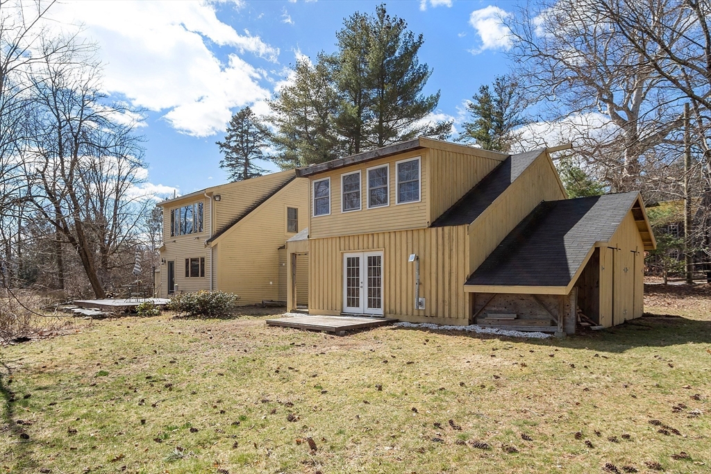 291 Still River Road Harvard, MA 01451 - Photo 41 of 42 a front view of a house with a yard