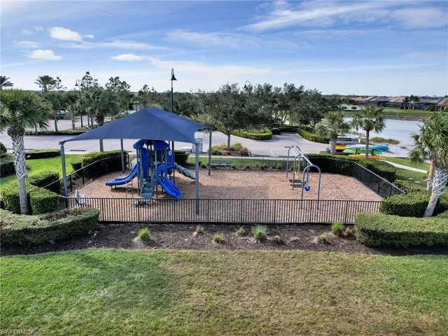 a view of a park with palm trees