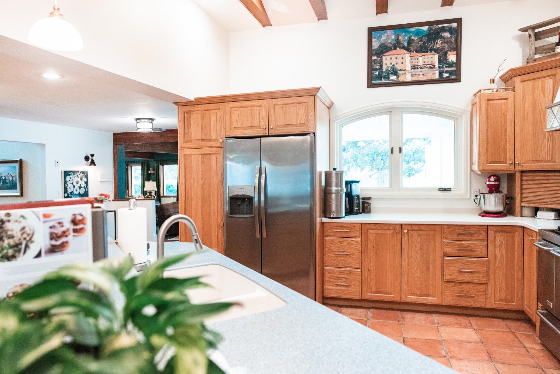 2619 H Road Grand Junction, CO 81506 - Photo 14 of 39 a large kitchen with stainless steel appliances granite countertop a refrigerator and a sink