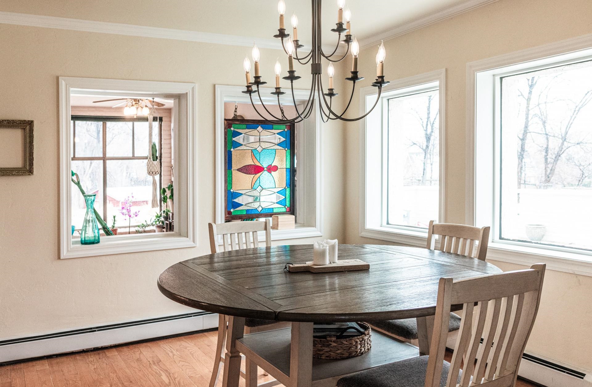 2619 H Road Grand Junction, CO 81506 - Photo 26 of 39 a view of a dining room with furniture window and wooden floor