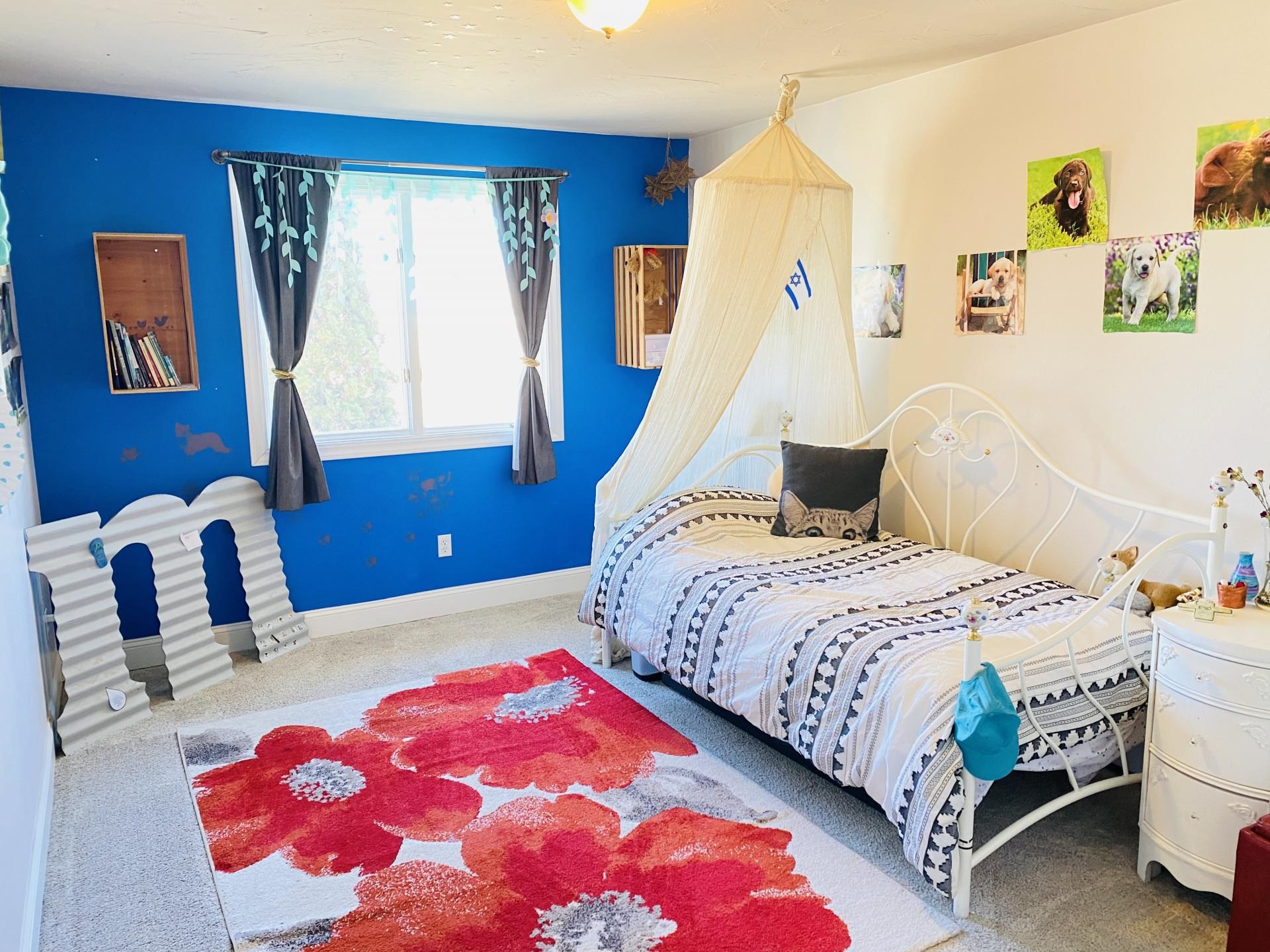 2619 H Road Grand Junction, CO 81506 - Photo 35 of 39 a bedroom with a bed and a window