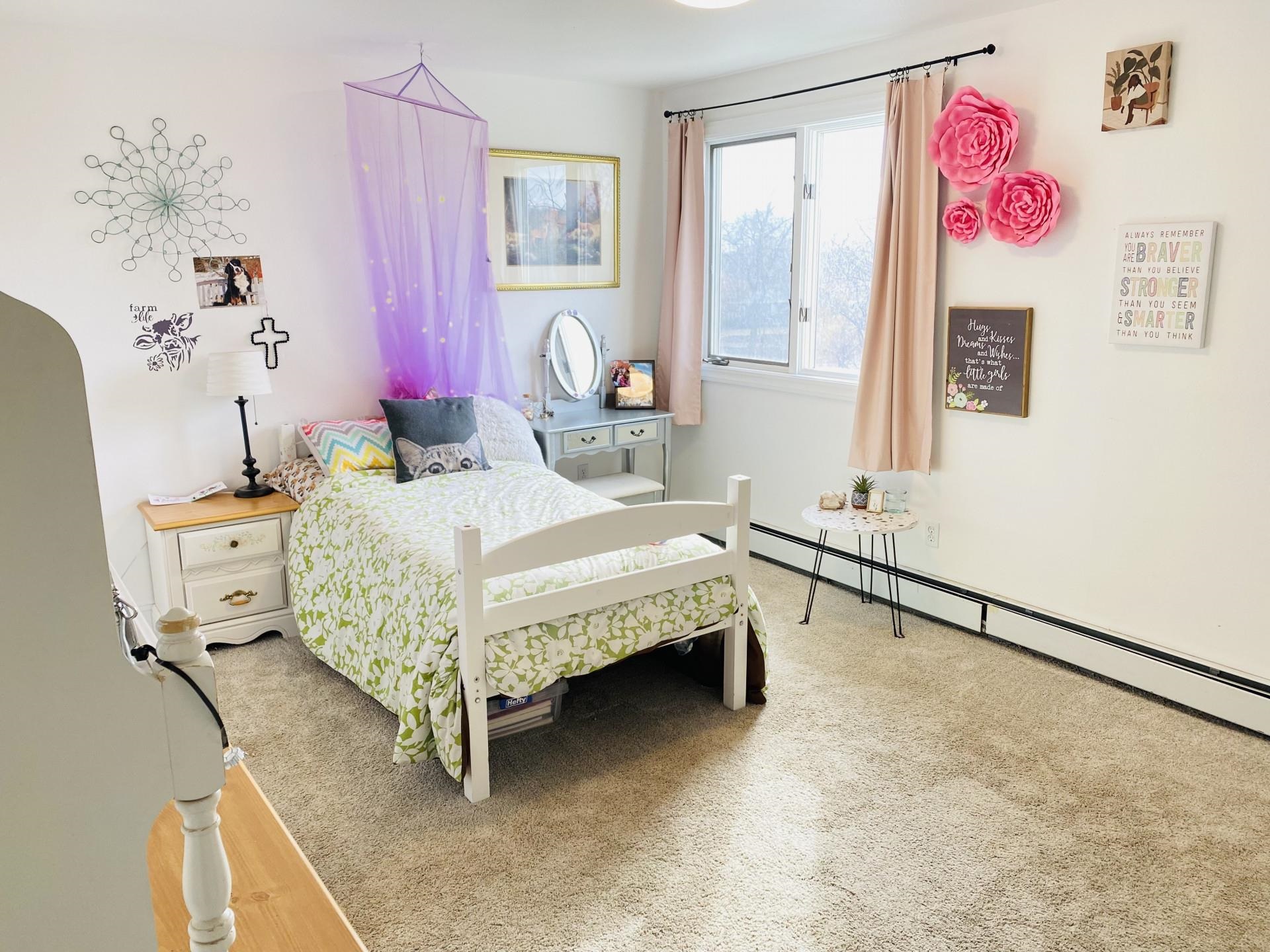 2619 H Road Grand Junction, CO 81506 - Photo 37 of 39 a bed room with a bed and a table