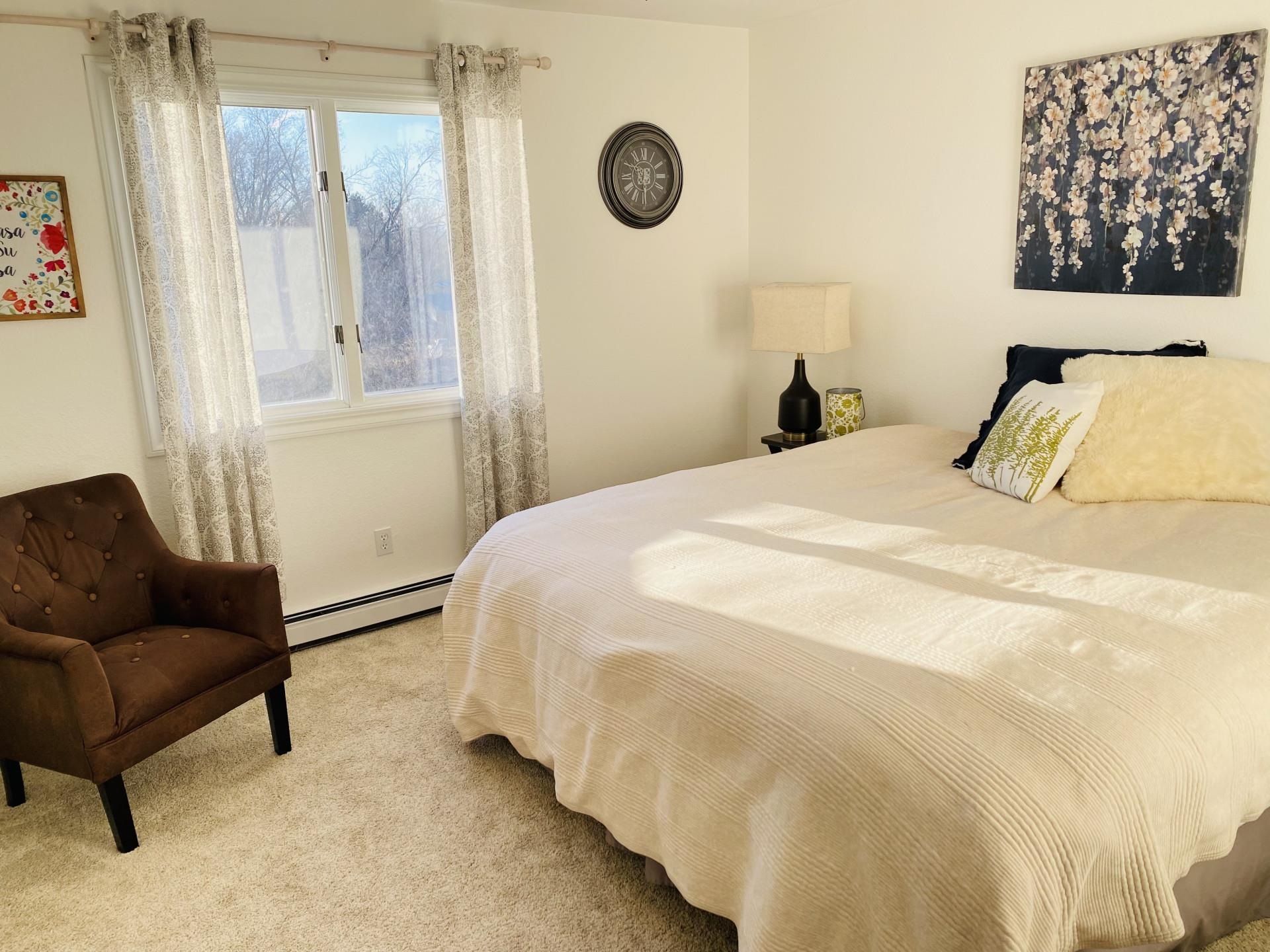 2619 H Road Grand Junction, CO 81506 - Photo 38 of 39 a bedroom with a bed and a couch