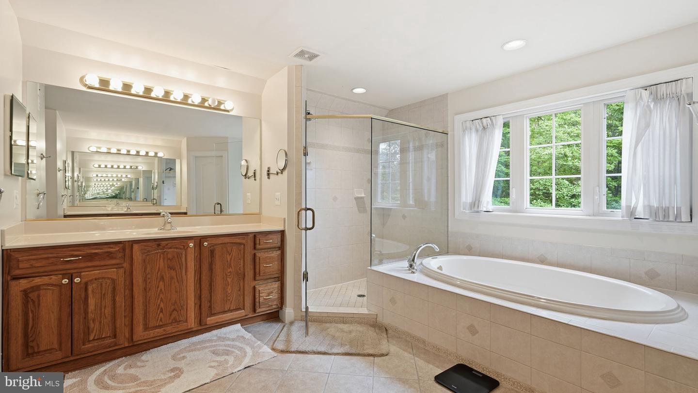 13301 Dumfries Road Manassas, VA 20112 - Photo 39 of 49 Elegant bathroom with natural light.