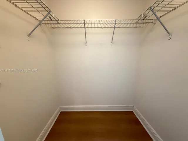 a view of a hallway to other door