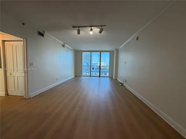 a view of empty room with a window