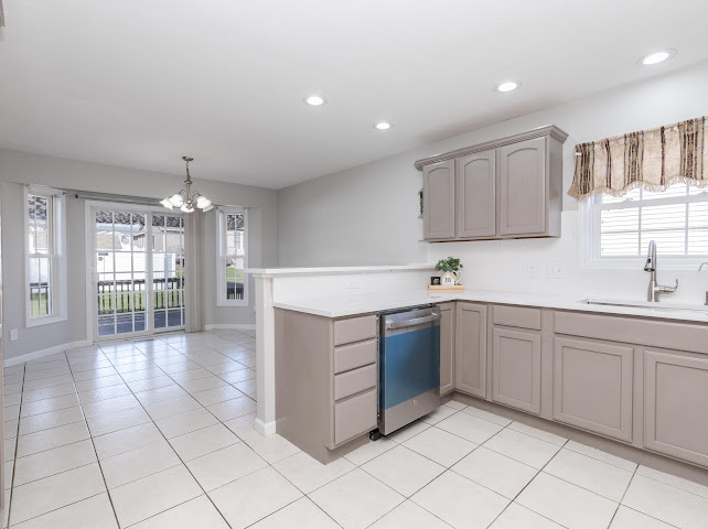 2275 Boulder Drive Normal, IL 61761 - Photo 12 of 41 a kitchen with a sink cabinets and window