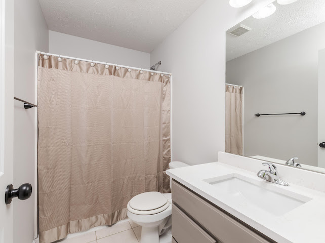 2275 Boulder Drive Normal, IL 61761 - Photo 16 of 41 a bathroom with a sink and toilet