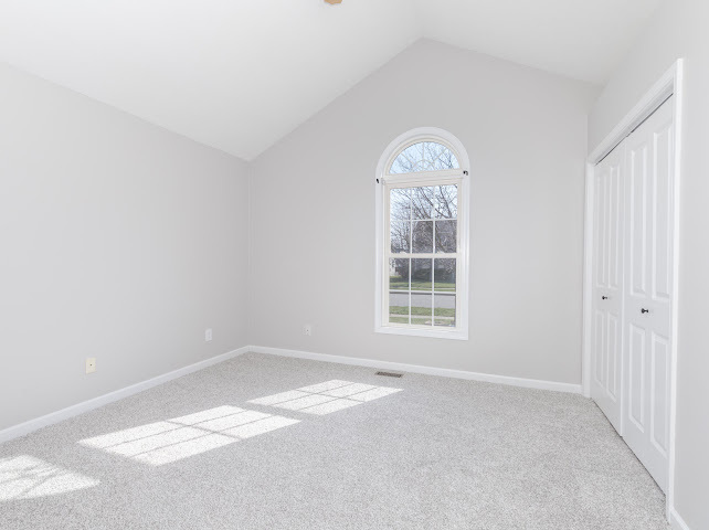 2275 Boulder Drive Normal, IL 61761 - Photo 17 of 41 an empty room with windows