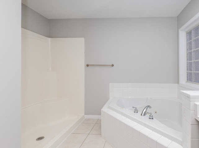 2275 Boulder Drive Normal, IL 61761 - Photo 23 of 41 a bathroom with a bathtub