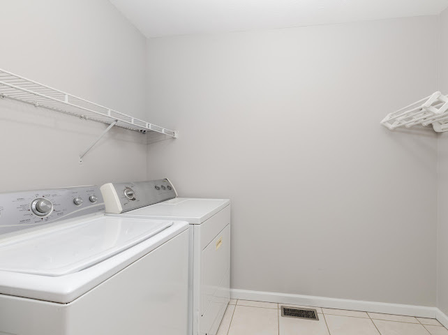 2275 Boulder Drive Normal, IL 61761 - Photo 25 of 41 a utility room with dryer and washer