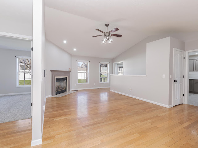 2275 Boulder Drive Normal, IL 61761 - Photo 4 of 41 a view of an empty room with window and wooden floor