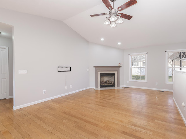 2275 Boulder Drive Normal, IL 61761 - Photo 5 of 41 a view of an empty room with window and wooden floor