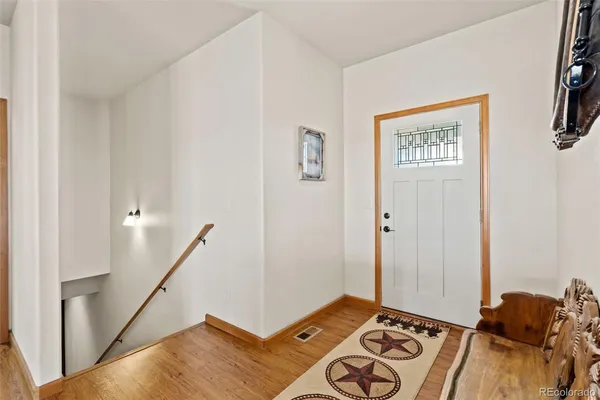 a view of a room with bed and hallway
