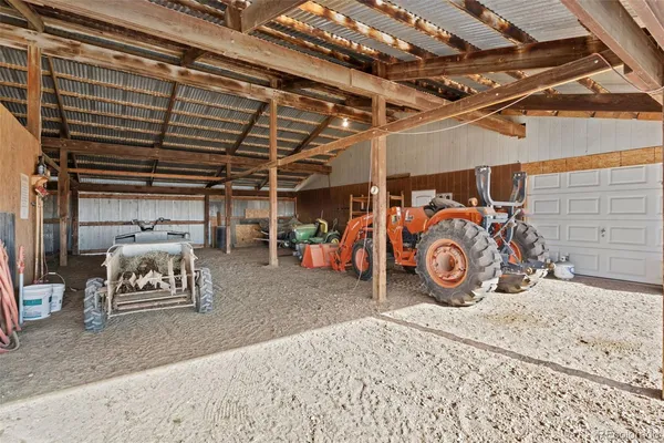 a view of a garage with parked cars