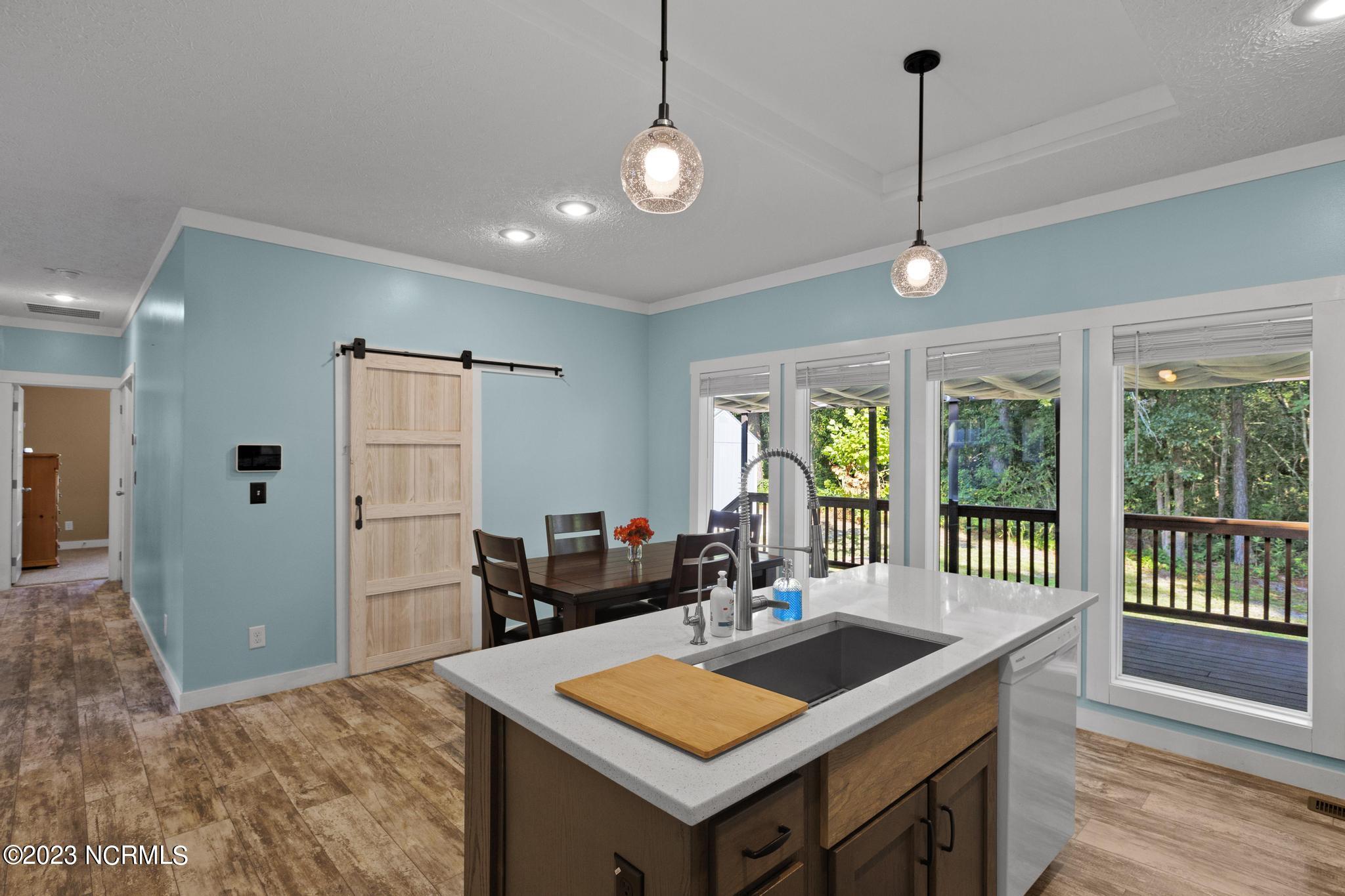 107 A Colbert Lane Hampstead, NC 28443 - Photo 13 of 32 Kitchen and Dining Area