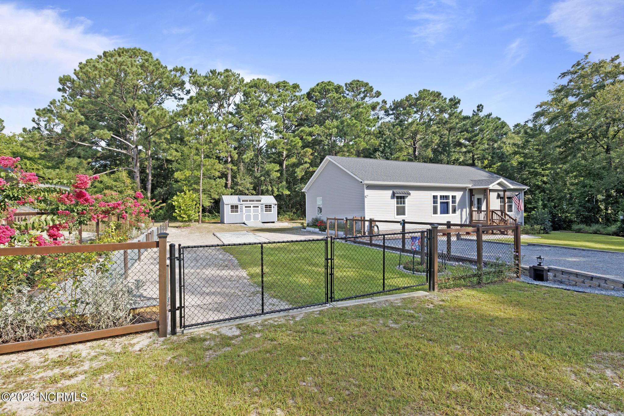 107 A Colbert Lane Hampstead, NC 28443 - Photo 2 of 32 Beautiful fenced yard!