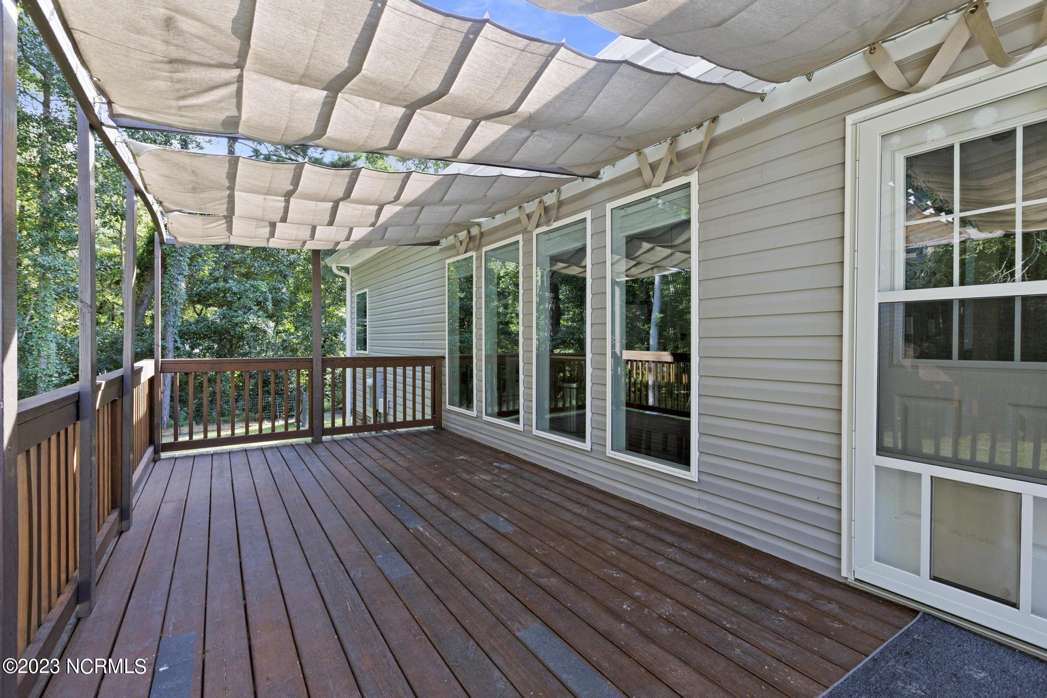 107 A Colbert Lane Hampstead, NC 28443 - Photo 28 of 32 Back Deck with Optional Shades
